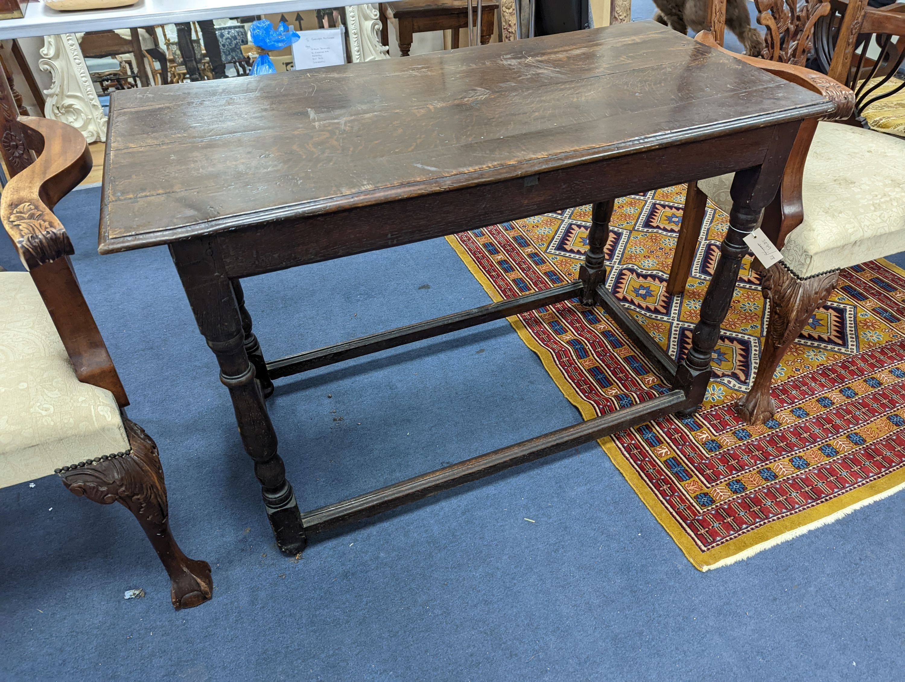 An 18th century rectangular oak table, width 112cm, depth 54cm, height 76cm